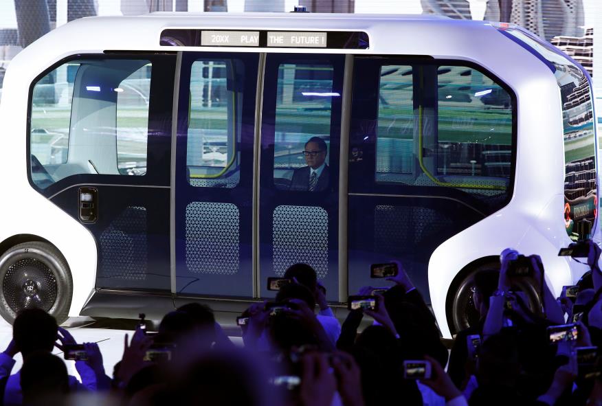 Toyota Motor Corporation President Akio Toyoda, arrives in their e-Palette auto<em></em>nomous co<em></em>ncept vehicle to give his presentation at the Tokyo Motor Show, in Tokyo, Japan October 23, 2019. REUTERS/Edgar Su