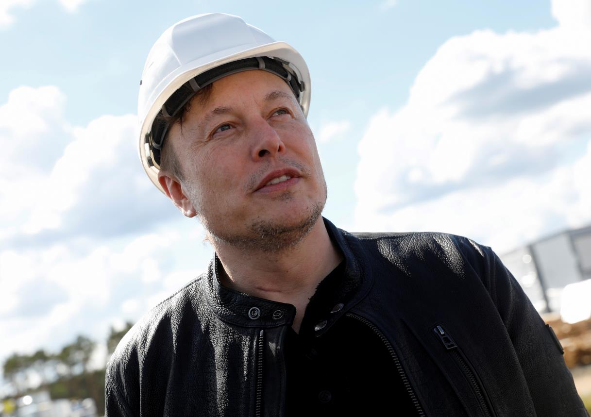 SpaceX founder and Tesla CEO Elon Musk looks on as he visits the co<em></em>nstruction site of Tesla's gigafactory in Gruenheide, near Berlin, Germany, May 17, 2021. REUTERS/Michele Tantussi/File Photo