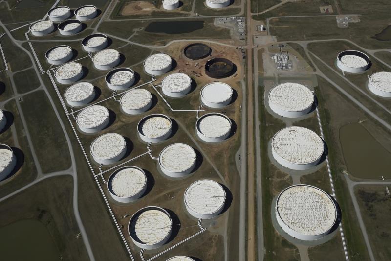 Crude oil storage tanks are seen from above at the Cushing oil hub, in Cushing, Oklahoma, March 24, 2016. REUTERS/Nick Oxford