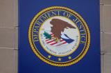 The crest of the United States Department of Justice (DOJ) is seen at their headquarters in Washington, May 10, 2021. REUTERS/Andrew Kelly  