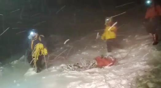 Members of Russia's Emergencies Ministry co<em></em>nduct a rescue operation after a group of climbers got stuck while climbing Mount Elbrus, in the Republic of Kabardino-Balkaria, Russia, in this still image from video taken September 23, 2021. Video taken September 23, 2021. Russia's Emergencies Ministry/Handout via REUTERS