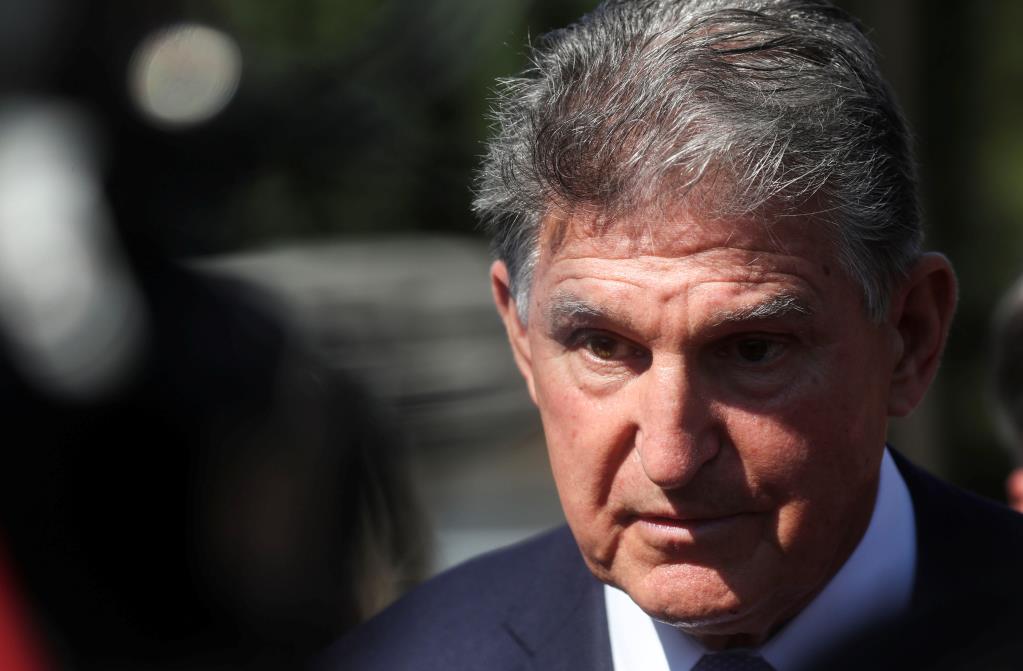 U.S. Senator Joe Manchin (D-WV) faces reporters outside the U.S. Capitol in Washington, U.S., September 30, 2021. REUTERS/Leah Millis