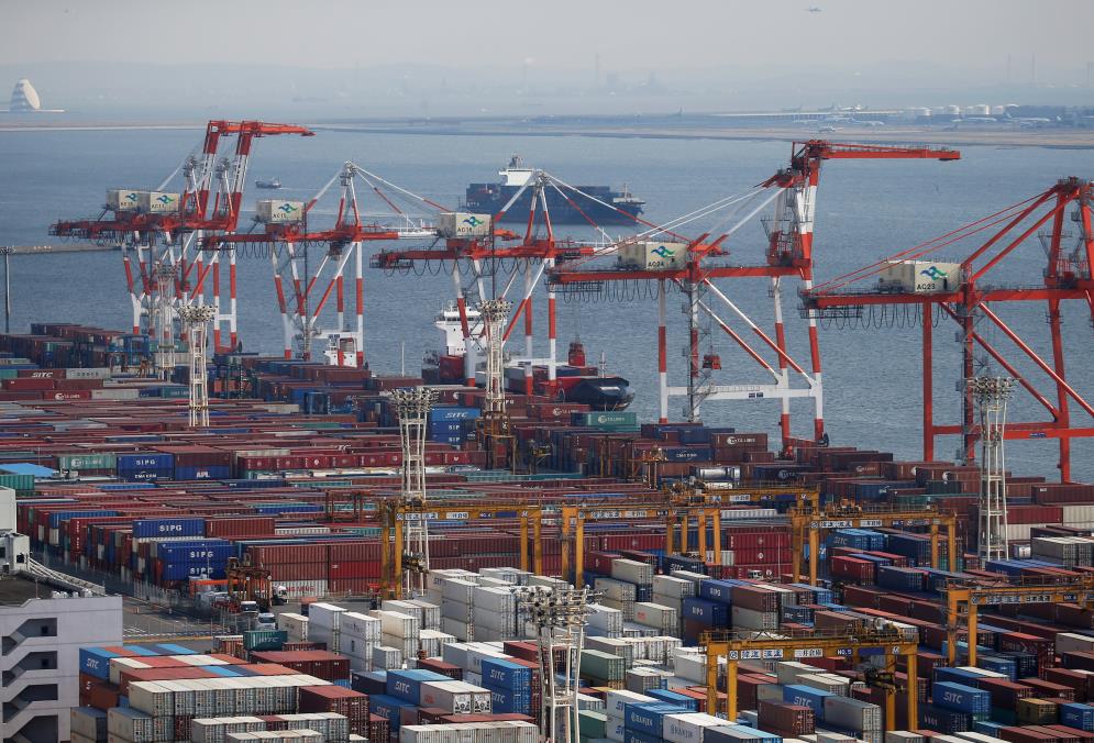 Shipping co<em></em>ntainers are seen at a port in Tokyo, Japan, March 22, 2017. REUTERS/Issei Kato