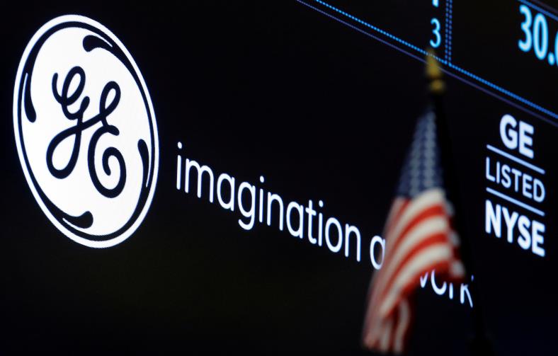 The ticker and logo for General Electric Co. is displayed on a screen at the post wher<em></em>e it's traded on the floor of the New York Stock Exchange (NYSE) in New York City, U.S., June 30, 2016.  REUTERS/Brendan McDermid/File Photo