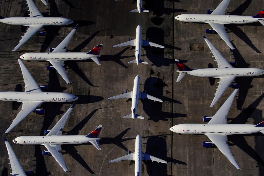 Delta Air Lines passenger planes are seen parked due to flight reductions made to slow the spread of coro<em></em>navirus disease (COVID-19), at Birmingham-Shuttlesworth Internatio<em></em>nal Airport in Birmingham, Alabama, U.S. March 25, 2020.  REUTERS/Elijah Nouvelage//File Photo