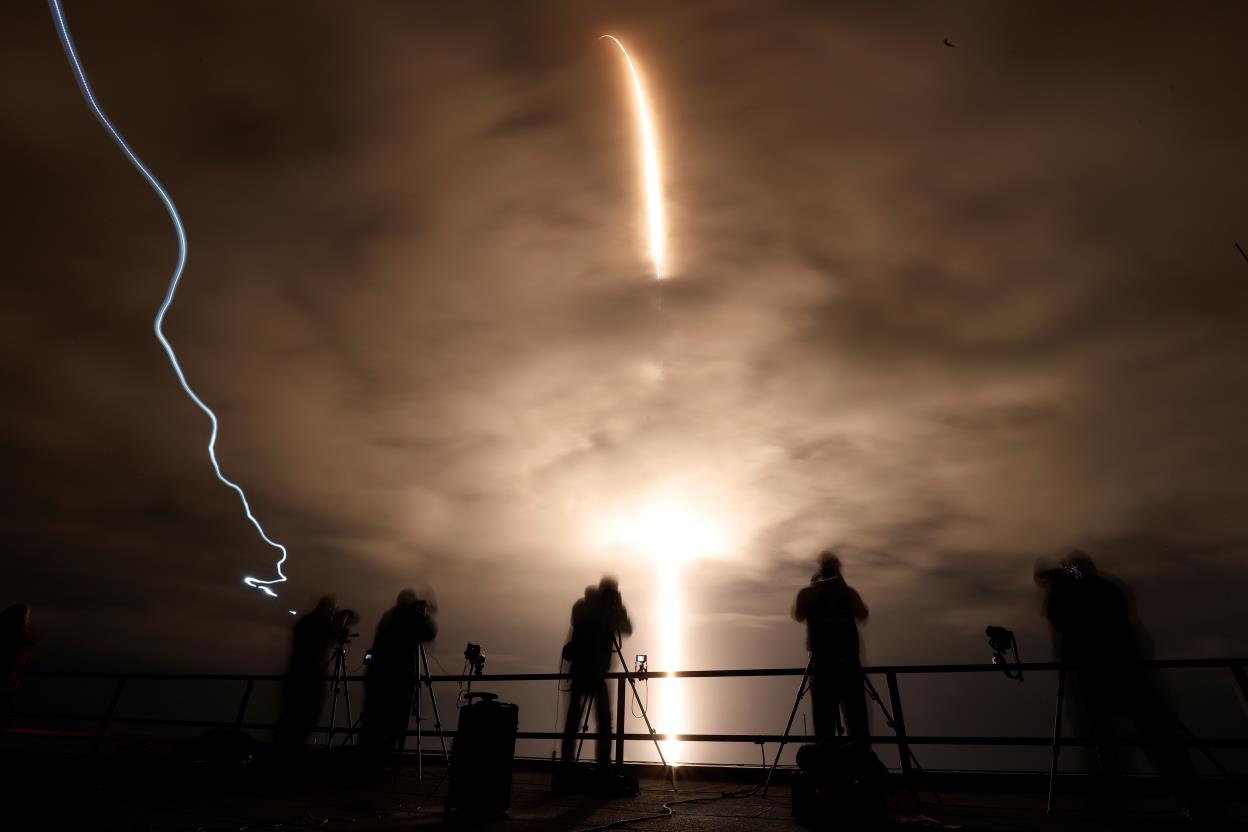 A long exposure shows a SpaceX Falcon 9 rocket, with the Crew Dragon capsule, as it is launched carrying three NASA and one ESA astro<em></em>nauts on a mission to the Internatio<em></em>nal Space Station at the Kennedy Space Center in Cape Canaveral, Florida, U.S. November 10, 2021. REUTERS/Thom Baur    