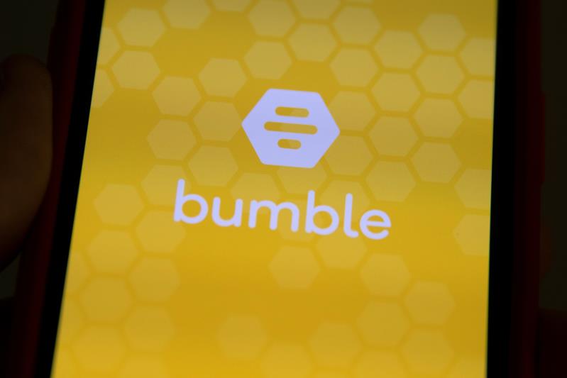 The Bumble Inc. (BMBL) app is shown on an Apple iPhone in this photo illustration as the dating app operator made its debut IPO on the Nasdaq stock exchange February 11, 2021.       REUTERS/Mike Blake/Illustration