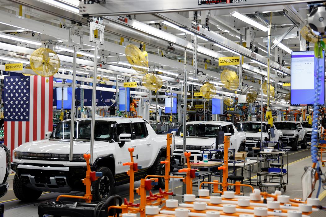 Hummer EV are seen on the production line as U.S. President Joe Biden tours the General Motors 'Factory ZERO' electric vehicle assembly plant, in Detroit, Michigan, U.S. November 17, 2021. REUTERS/Jo<em></em>nathan Ernst