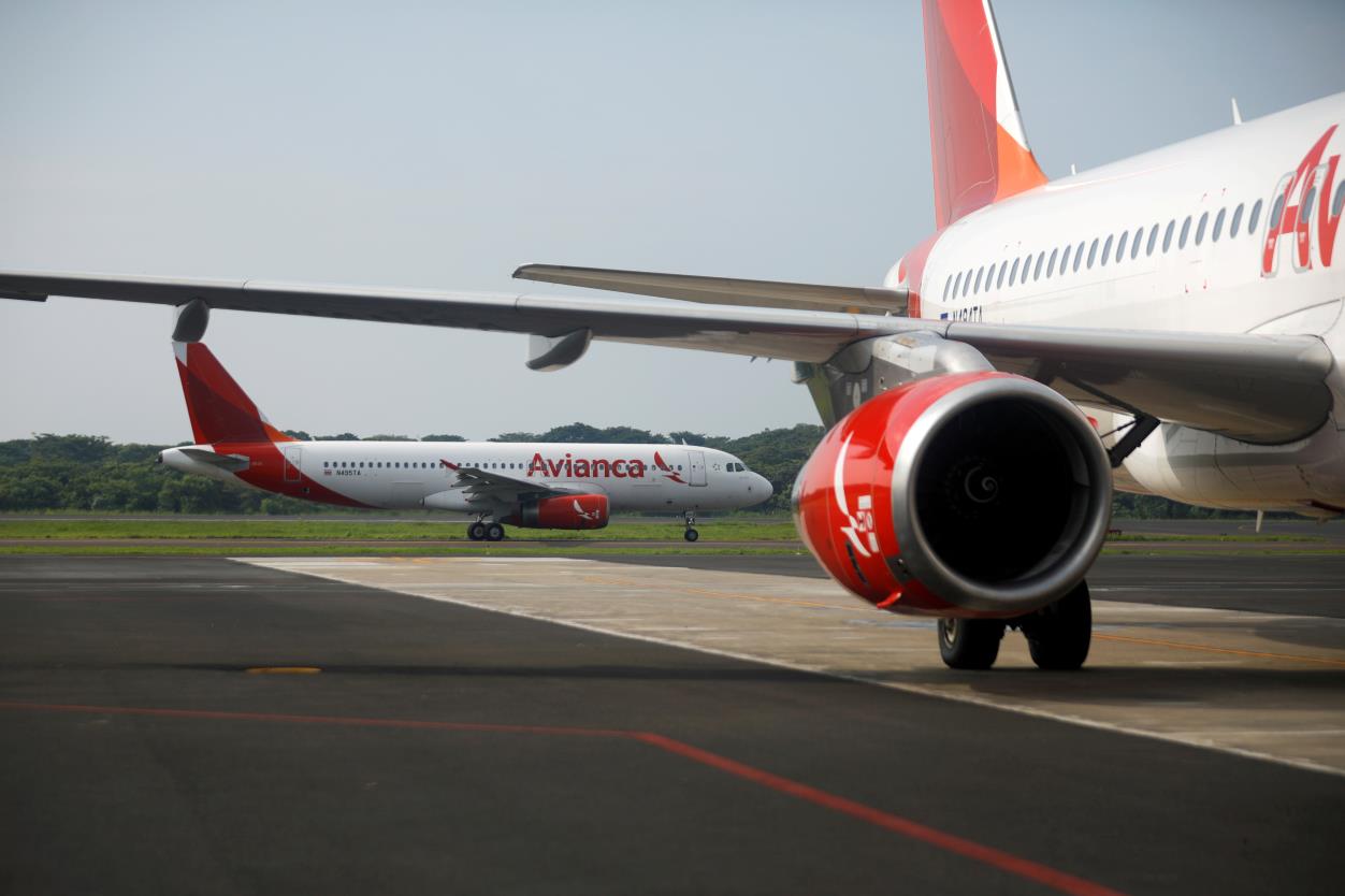 A departing Avianca Airlines flight is seen on the tarmac during the reopening ceremony at the Mons. Oscar Arnulfo Romero Internatio<em></em>nal Airport, in San Luis Talpa, El Salvador September 19, 2020. REUTERS/Jose Cabezas/File Photo