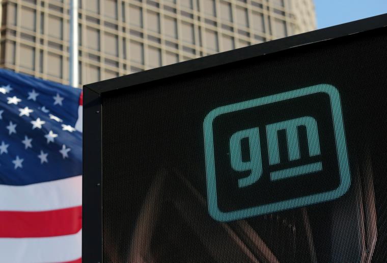 The new GM logo is seen on the facade of the General Motors headquarters in Detroit, Michigan, U.S., March 16, 2021.  REUTERS/Rebecca Cook