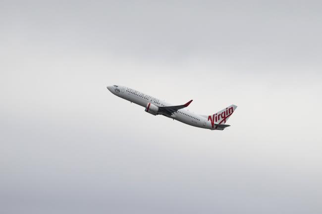 A Virgin Australia Airlines Boeing 737-800 plane takes off from Sydney Airport in Sydney, Australia, October 28, 2020.  REUTERS/Loren Elliott