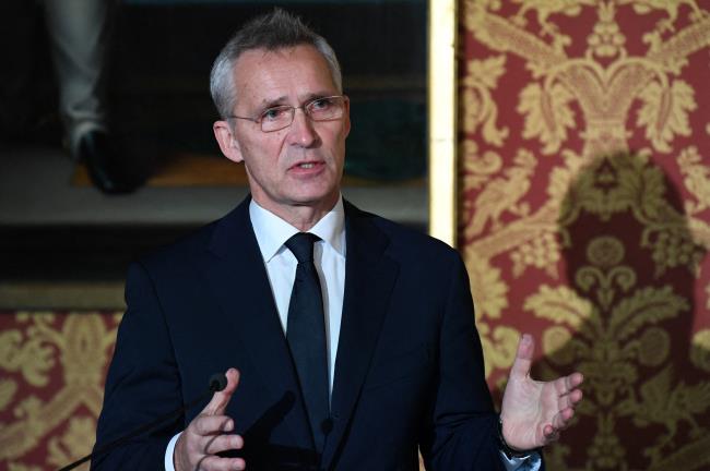 NATO Secretary General Jens Stoltenberg speaks at a news co<em></em>nference following a meeting with French defence and foreign ministers in Paris, France December 10, 2021. Bertrand Guay/Pool via REUTERS/Files