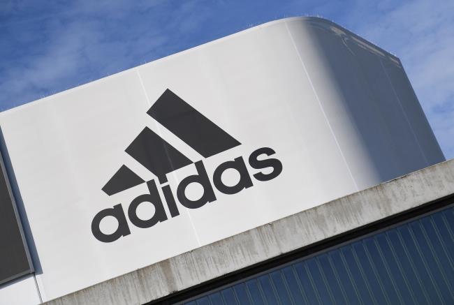 The Adidas logo is pictured during celebrations for German sports apparel maker Adidas' 70th anniversary at the company's headquarters in Herzogenaurach, Germany, August 9, 2019. REUTERS/Andreas Gebert