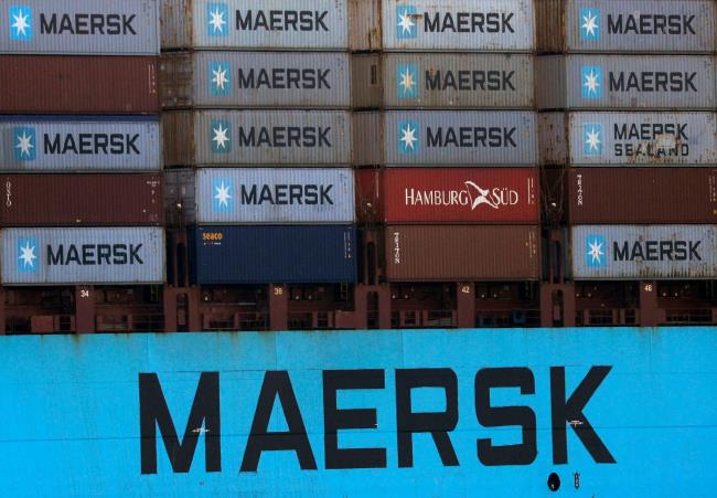 Shipping co<em></em>ntainers are transported on a Maersk Line vessel through the Suez Canal in Ismailia, Egypt July 7, 2021. Picture taken July 7, 2021. REUTERS/Amr Abdallah Dalsh/File Photo