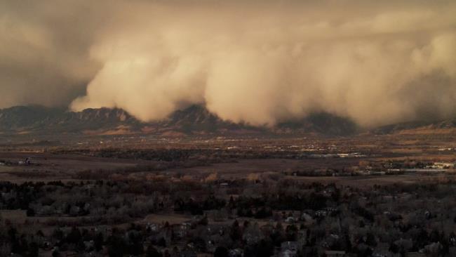 A cloud of dust storm is observed in Niwot, Colorado, U.S. December 15, 2021 in this screen grab obtained from a social media video. Kirk Fischer/via REUTERS 