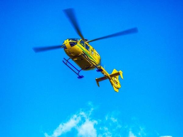 An air ambulance perched itself on the bridge over the station (stock)