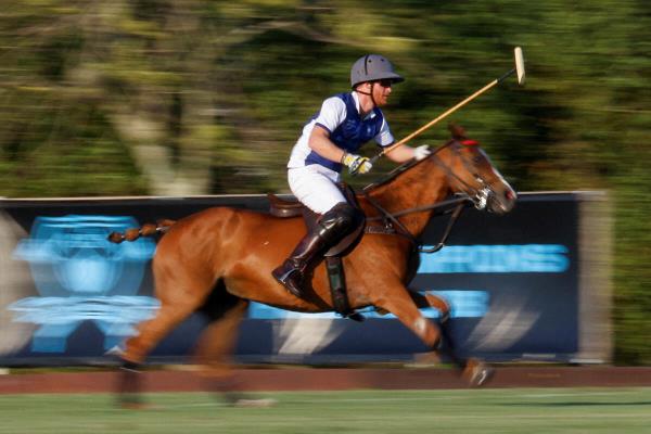 Britain's Prince Harry participates in the Royal Salute Polo Challenge to benefit Sentebale, a charity founded by him and Prince Seeiso of Lesotho to support children in Lesotho and Botswana, in Wellington, Florida, U.S., April 12, 2024. 