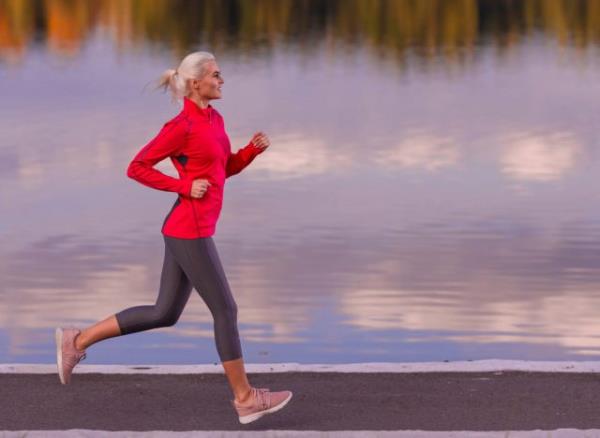 fit woman running outdoors, co<em></em>ncept of best type of exercise for weight loss