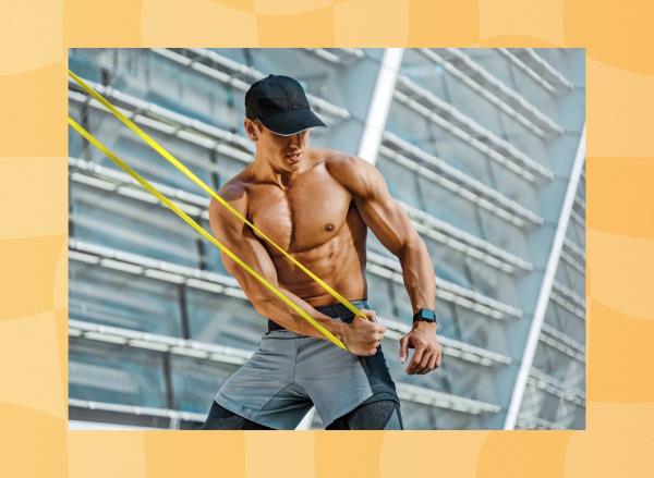 shirtless, fit, muscular man doing arm workout with resistance band