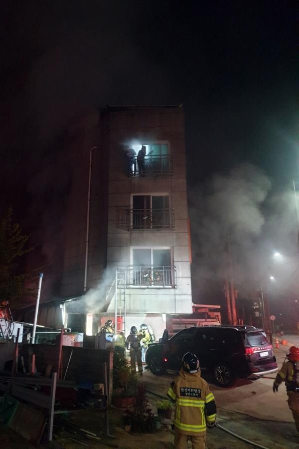 This photo provided by Gwangsan Fire Station shows the outside of the building that was scorched by fire early Tuesday. (Gwangsan Fire Station)