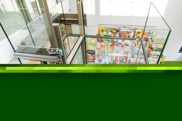 The LAM museum displayed the cans in the glass lift shaft as if they had been left behind during construction. — Picture from LAM