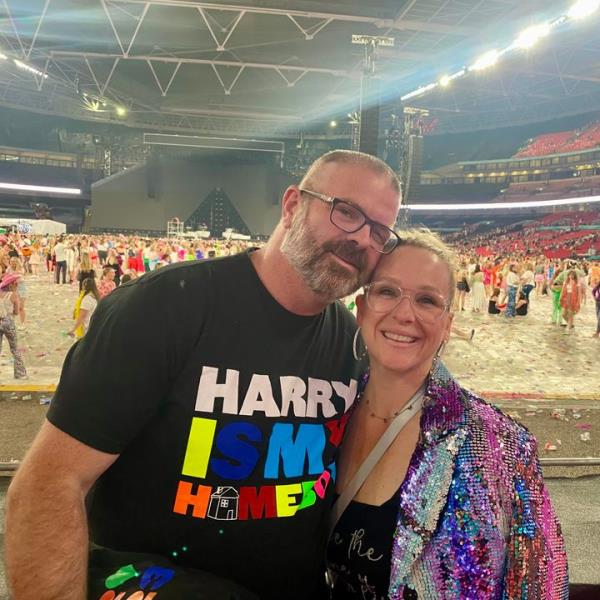 The author and her husband attend a Harry Styles co<em></em>ncert at Wembley Stadium in England.