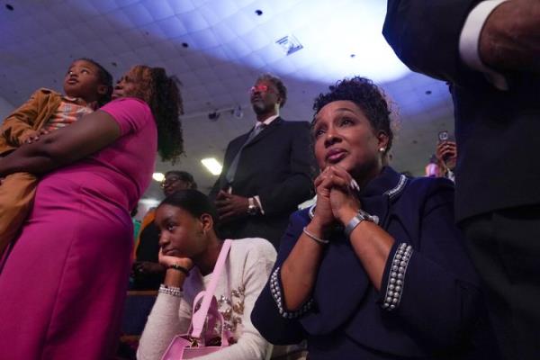 Harris supporters listen as she speaks at Divine Faith Ministries Internatio<em></em>nal in Jonesboro, Georgia, on October 20, 2024.