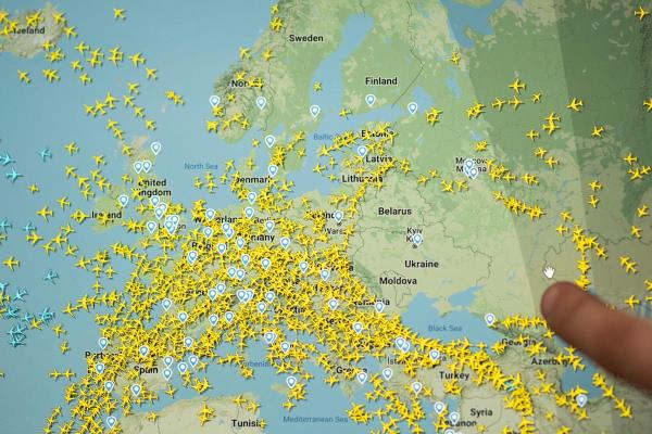 The Flightradar 24 website shows civilian flights in Europe avoiding Ukraine airspace just after Russia launched its full-scale invasion in February 2022 (Loic Venance/AFP via Getty Images)