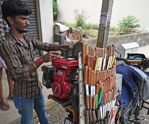 For DH Spectrum: A mobile knife sharpener in Rajarajeshwari Nagar Benglauru. 