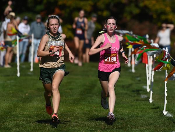 Century's Taylor Colson comes to the finish to win the girls varsity race during the Carroll County cross country champio<em></em>nships at McDaniel College on Tuesday. (Brian Krista/Staff)