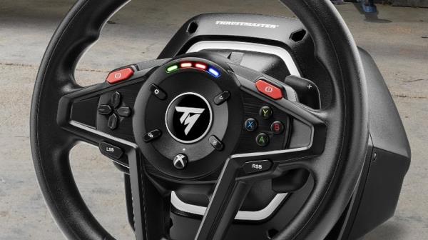 Close-up shot of a Thrustmaster T128X racing wheel.