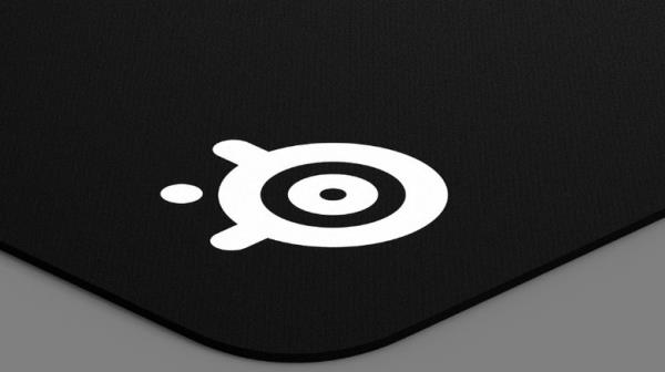 A corner of the SteelSeries QcK Gaming Mouse Pad