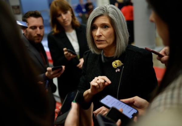 U.S. Sen. Joni Ernst (R-IA) speaks to reporters as she walks to a Senate luncheons at the U.S. Capitol on November 19, 2024 in Washington, DC. (Photo by Kevin Dietsch/Getty Images)