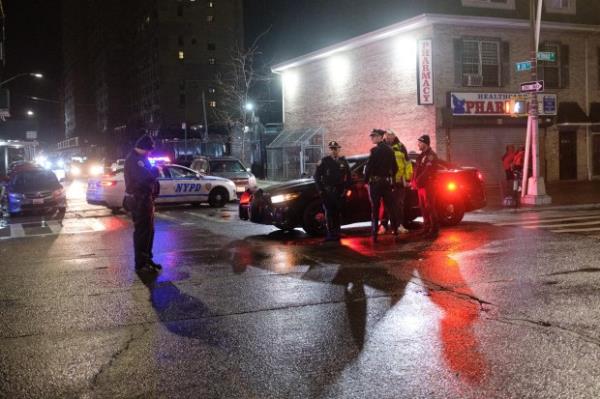 The NYPD Highway Patrol investigates after two pedestrians were struck on Mermaid Avenue and West 24th Street in Co<em></em>ney Island, Brooklyn, New York City on Friday, March 3, 2023. (Gardiner Anderson for New York Daily News