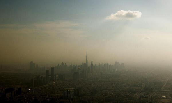 An aerial view of the Dubai skyline including the Burj Khalifa Tower as seen from a Turkish Airlines aircraft