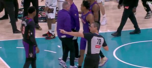 Referee J.T. Orr winds his arm backwards before tossing the Raptors' head coach from Thursday's contest.