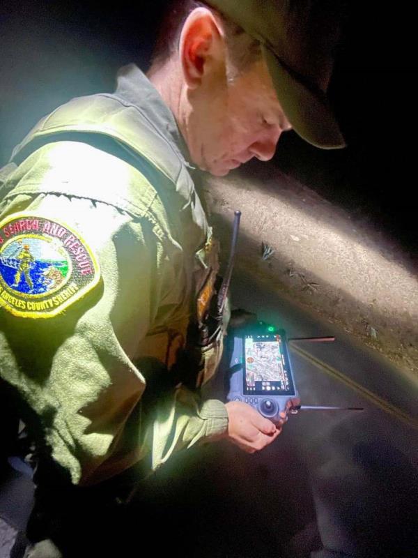 A Malibu Search and Rescue drone pilot operates the the co<em></em>nsole during the search.