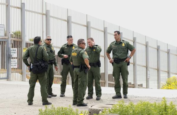 Border Patrol agents patrol the area near wher<em></em>e Attorney General Jeff Sessions addresses the media during a press co<em></em>nference at Border Field State Park  on May 7, 2018 in San Ysidro, CA.  