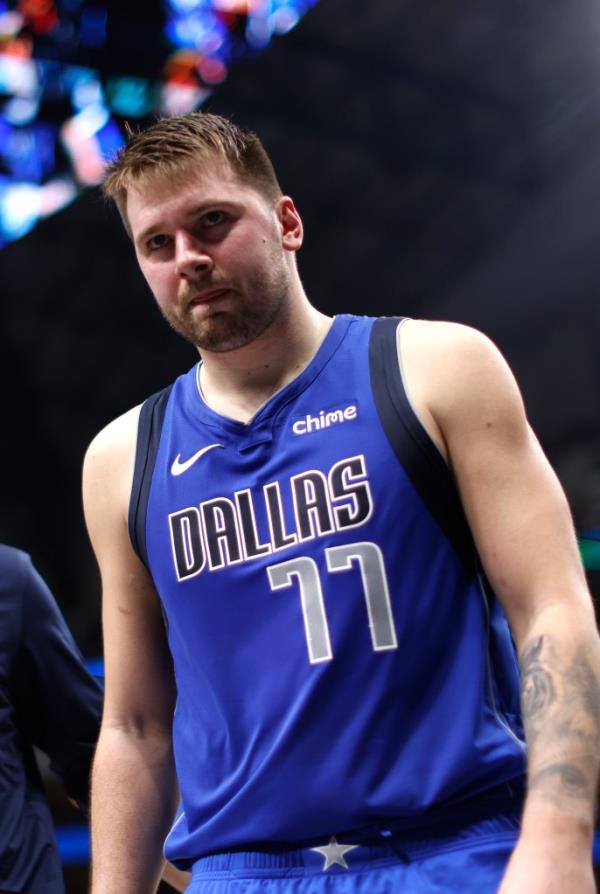 Luka Do<em></em>ncic #77 of the Dallas Mavericks leaves the court against the Minnesota Timberwolves.