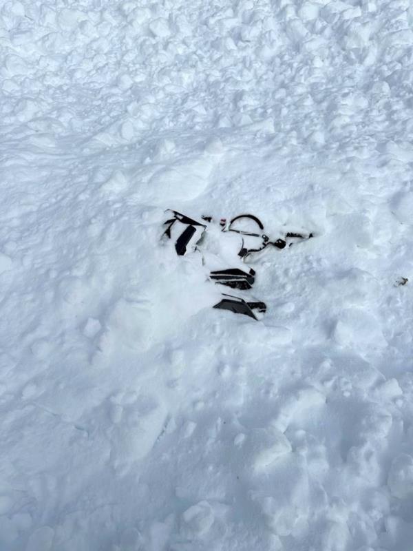 Two brothers safe after surviving an avalanche in the snow-covered Steep Hollow area, Franklin Basin, Cache County, Utah