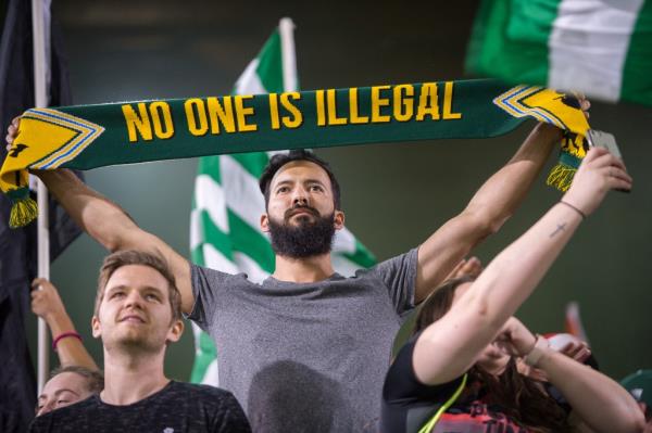 Portland Timbers fan shows a political inspired scarf that reads "no one is illegal" in support with unnew<em></em>lineed immigrants to the US at the end of the Portland Timbers 2-0 victory over the San Jose Earthquakes on June 2, 2017 at Providence Park in Portland, Oregon.