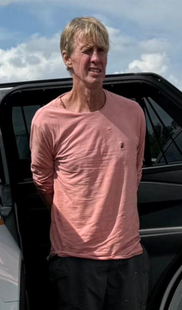 Ryan Wesley Routh, in a pink shirt, following his arrest on September 15, 2024 in Martin County, Florida