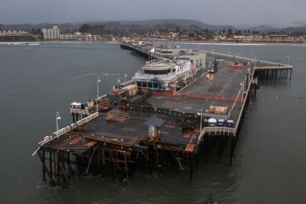 Damage to the Santa Cruz Wharf is seen in Santa Cruz, Calif., Tuesday, Dec. 24, 2024.