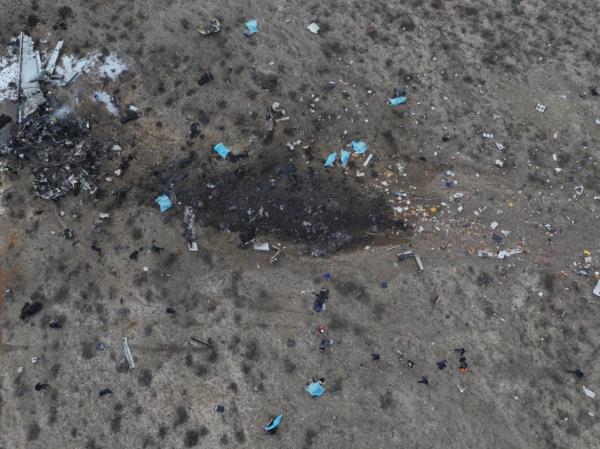 A drone view shows the crash site of an Azerbaijan Airlines passenger plane near the city of Aktau, Kazakhstan