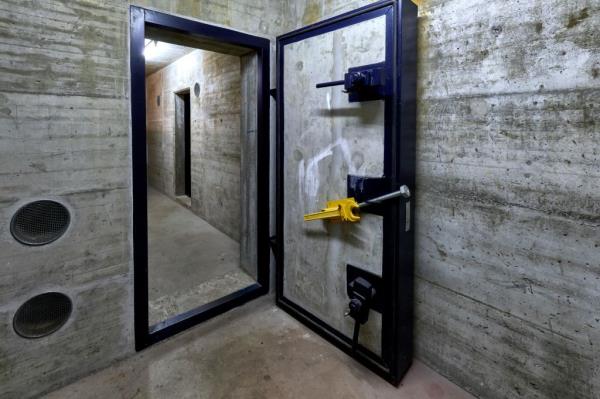 armored door of a public fallout shelter in an apartment building in Switzerland.