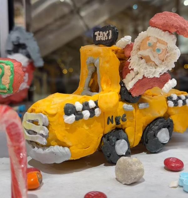 Taxi-driving Santa Claus at NYC artist Jon Lovitch's Gingerbread Lane exhibit 