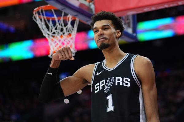 Victor Wembanyama reacts during the Spurs-76ers game on Dec. 23, 2024. 