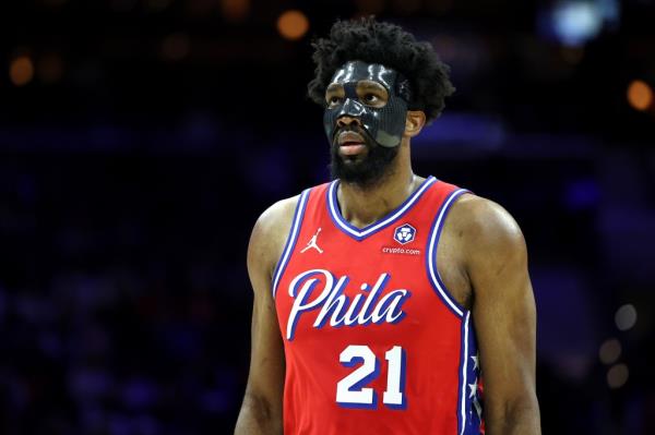 Joel Embiid looks on during the 76ers- Hornets game on Dec. 20, 2024. 