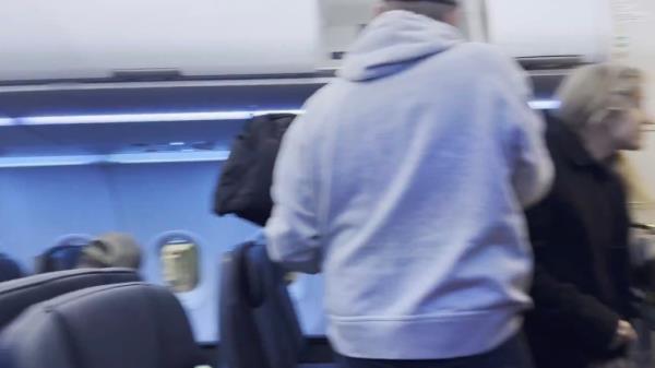 In one video, passengers were seen deplaning on Tuesday morning at Boston's Logan Airport.