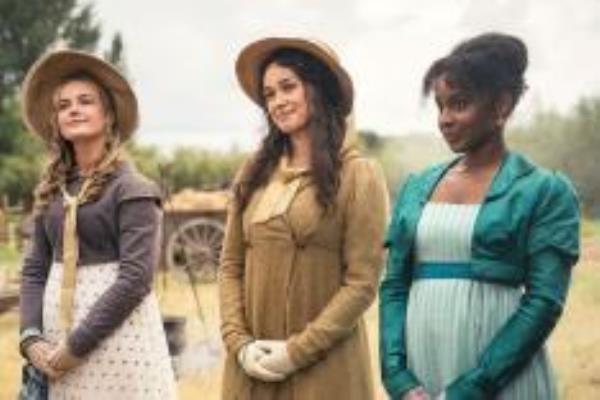 A group of women including Rose Williams and Steffany Huckaby dressed in period costume for the show Sanditon